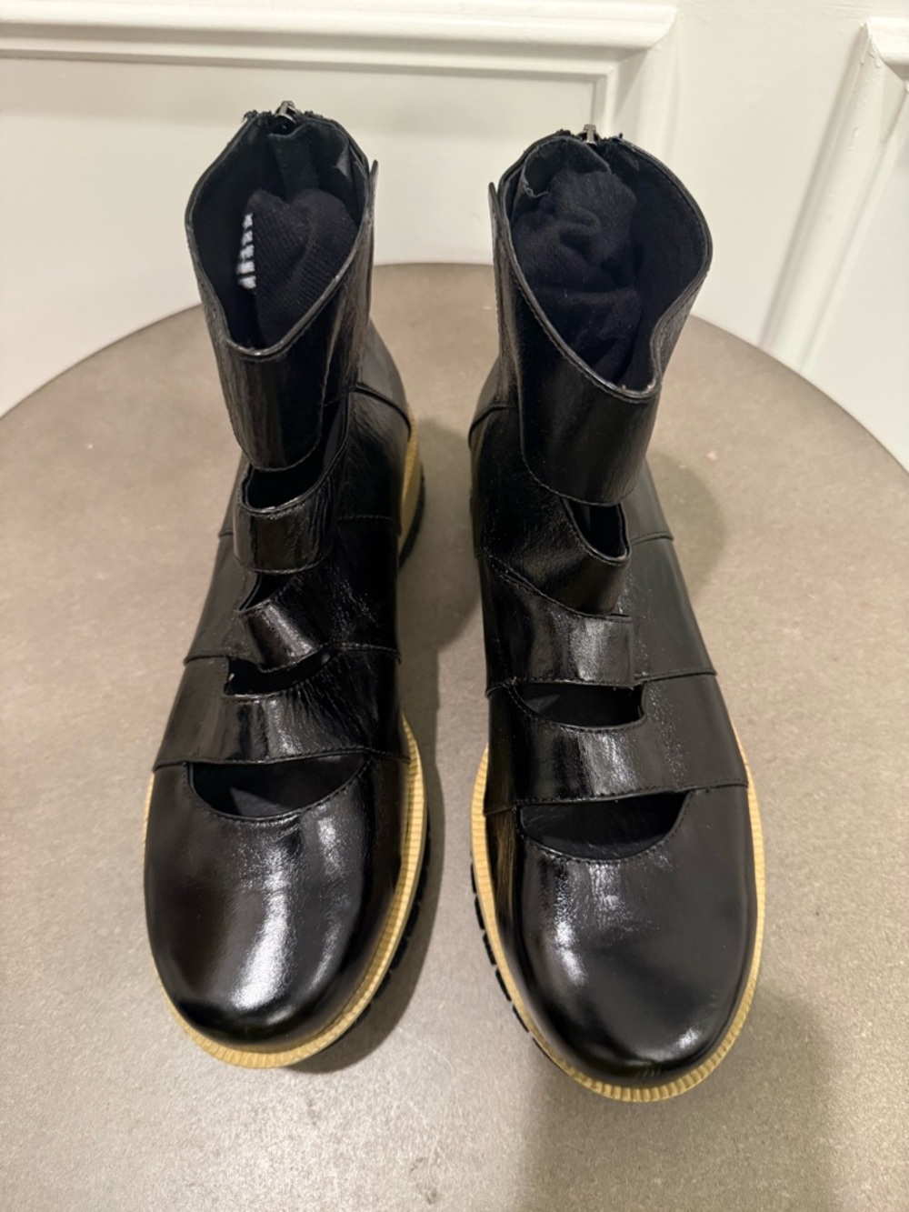 Antelope Black Leather Ankle Boots with Contrasting Tan Sole